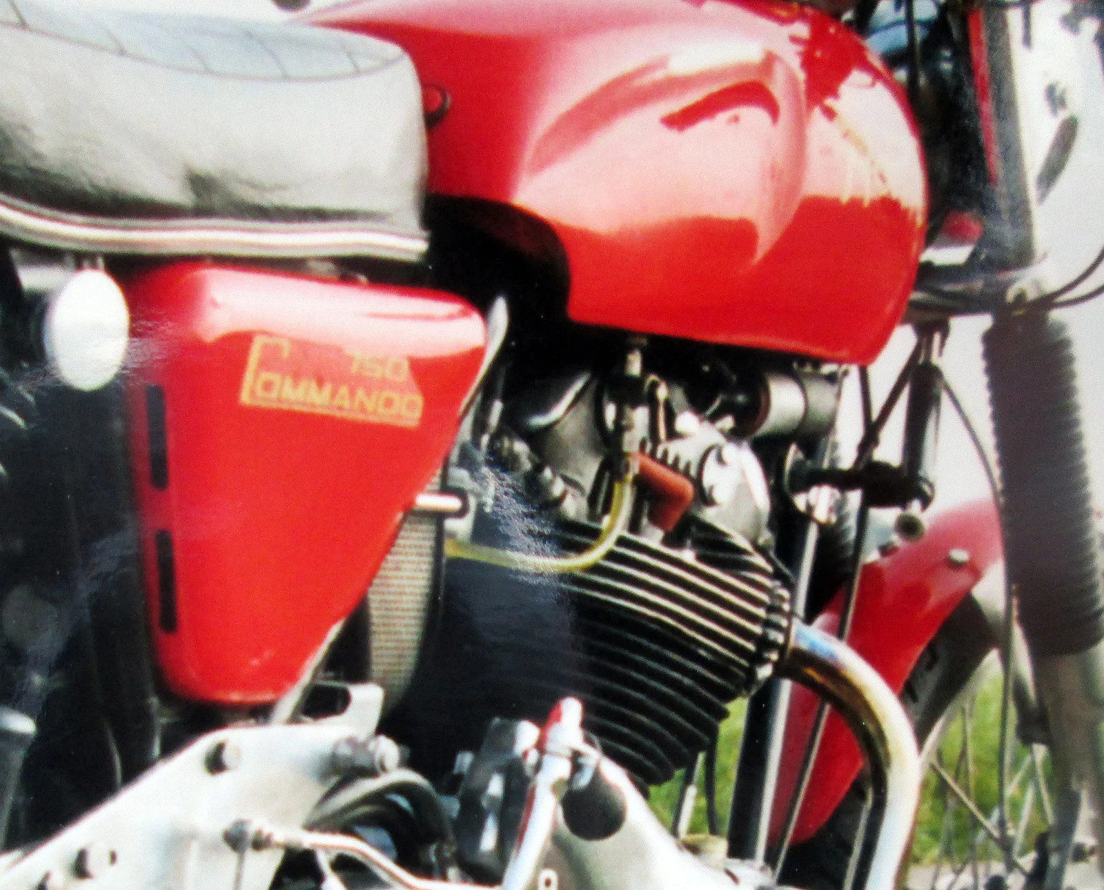 Side cover over oil tank