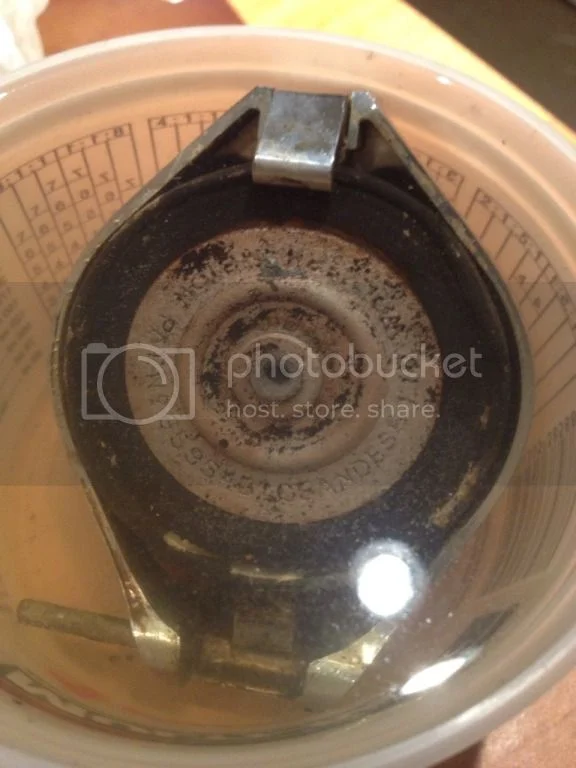 Cleaning gas tank cap with metal rescue Access Norton