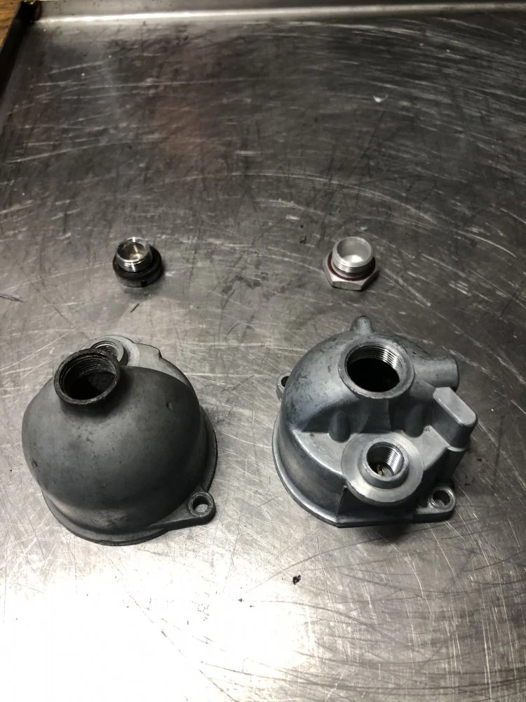 Remove jet holder through drain plug?