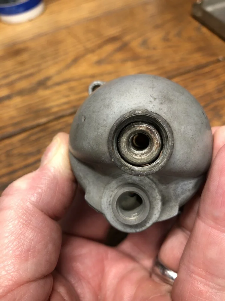 Remove jet holder through drain plug?