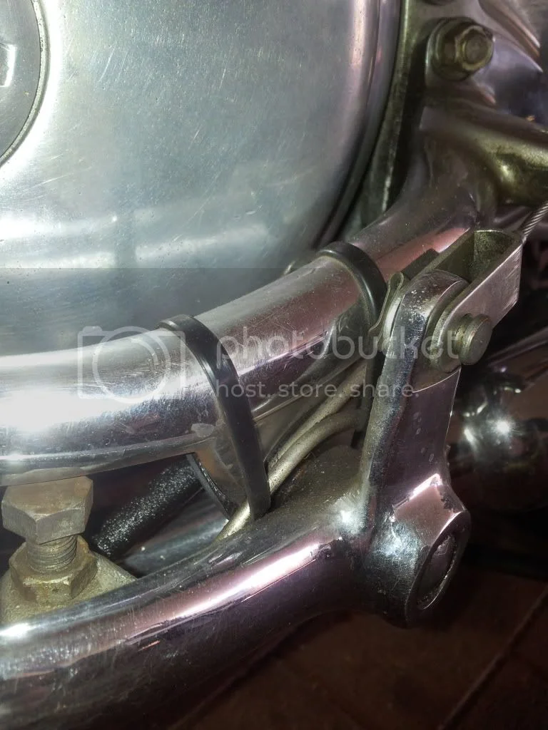 Rear brake return spring