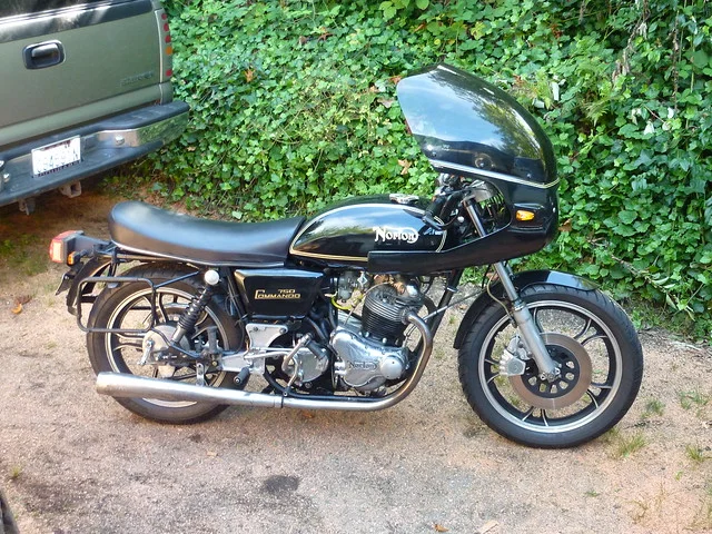 Early oil tank banjo feed and return