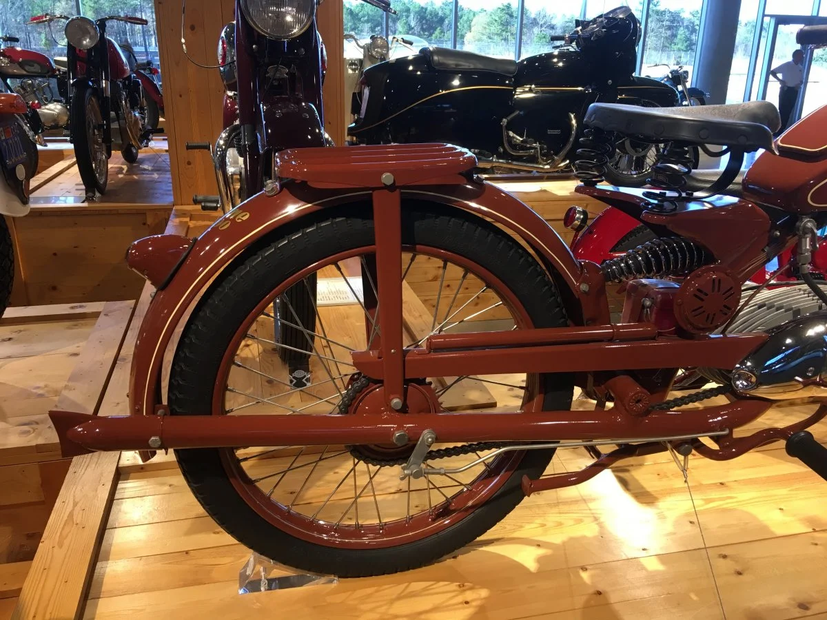 Swinging arm exhaust pipe...