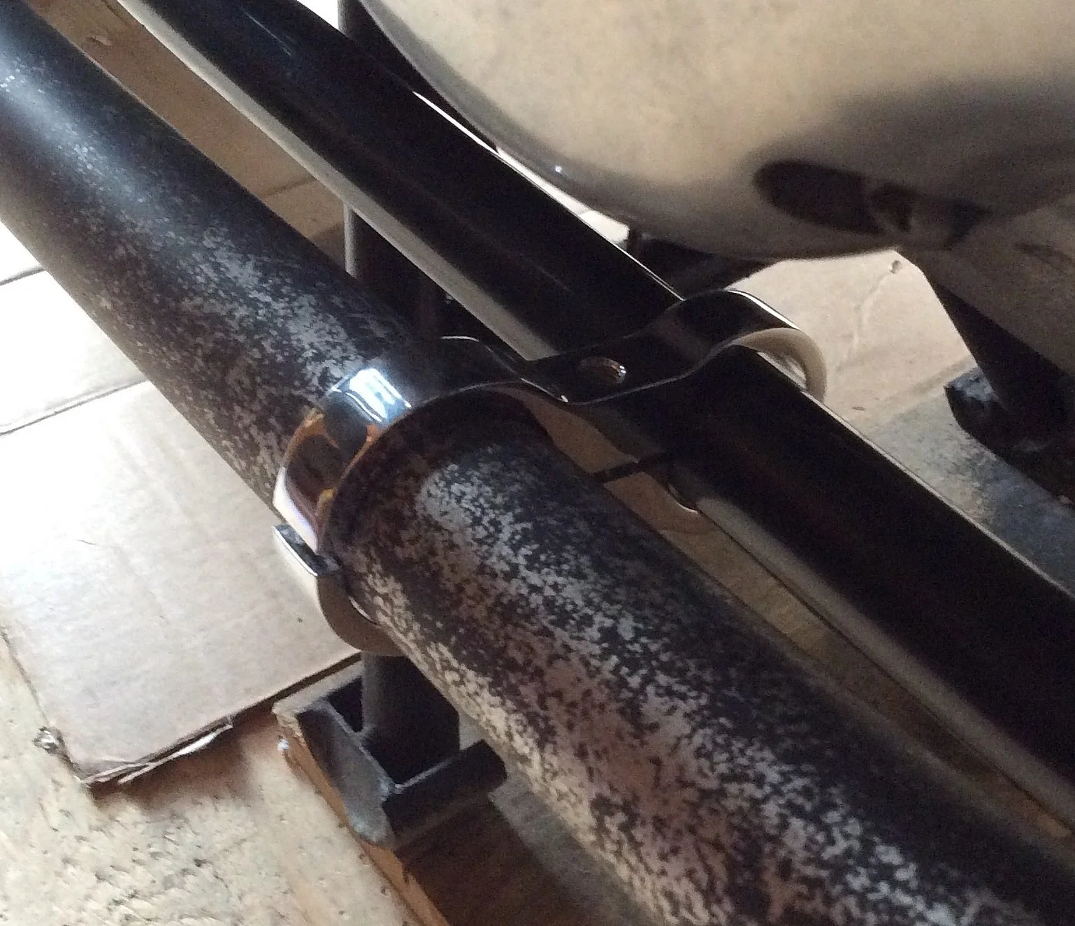 Engineering compromises leading to exhaust threads stripped (2012)