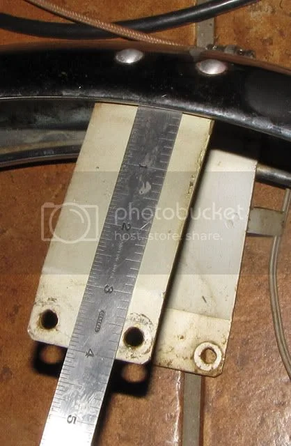 early narrow fender on later fatter tire