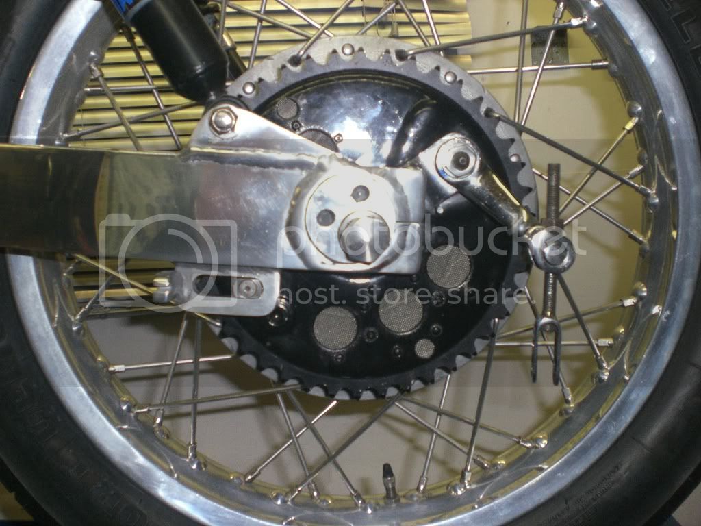 One piece rear wheel spindle