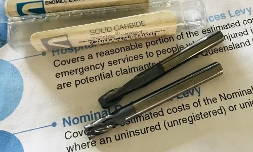 Drilling rocker spindles.