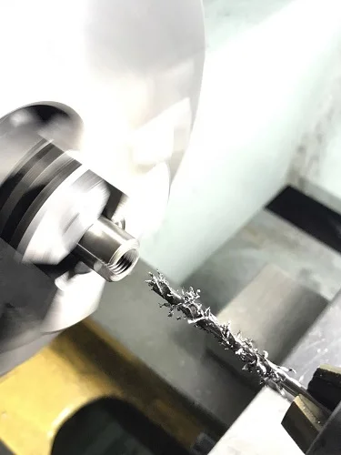 Drilling rocker spindles.