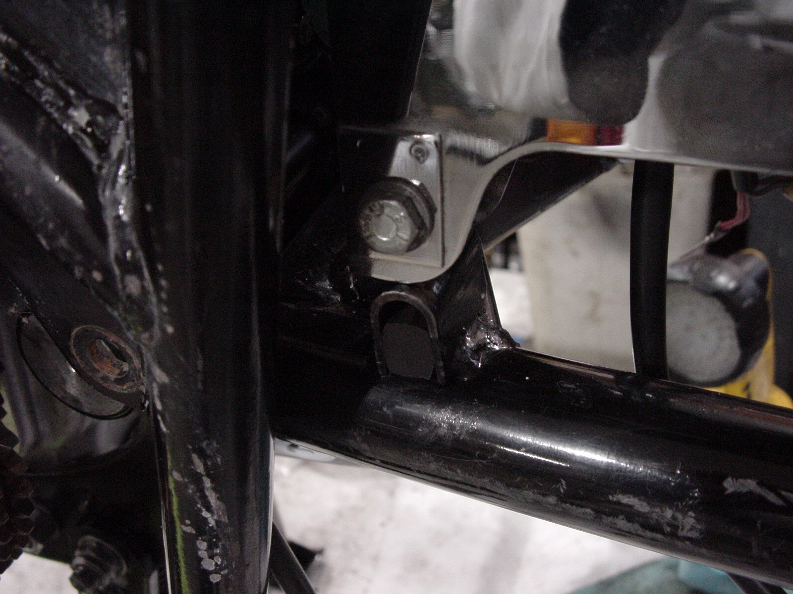 Hard Rubber spacer for the front  bolt attaching the chain guard on a MK2A
