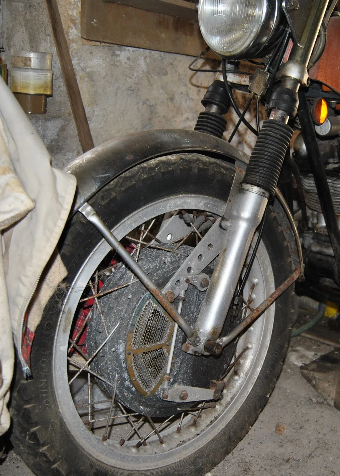 early narrow fender on later fatter tire