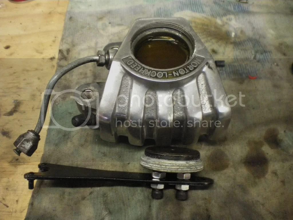 Lockheed caliper cap alternatives? Wax or Grease it! Access Norton