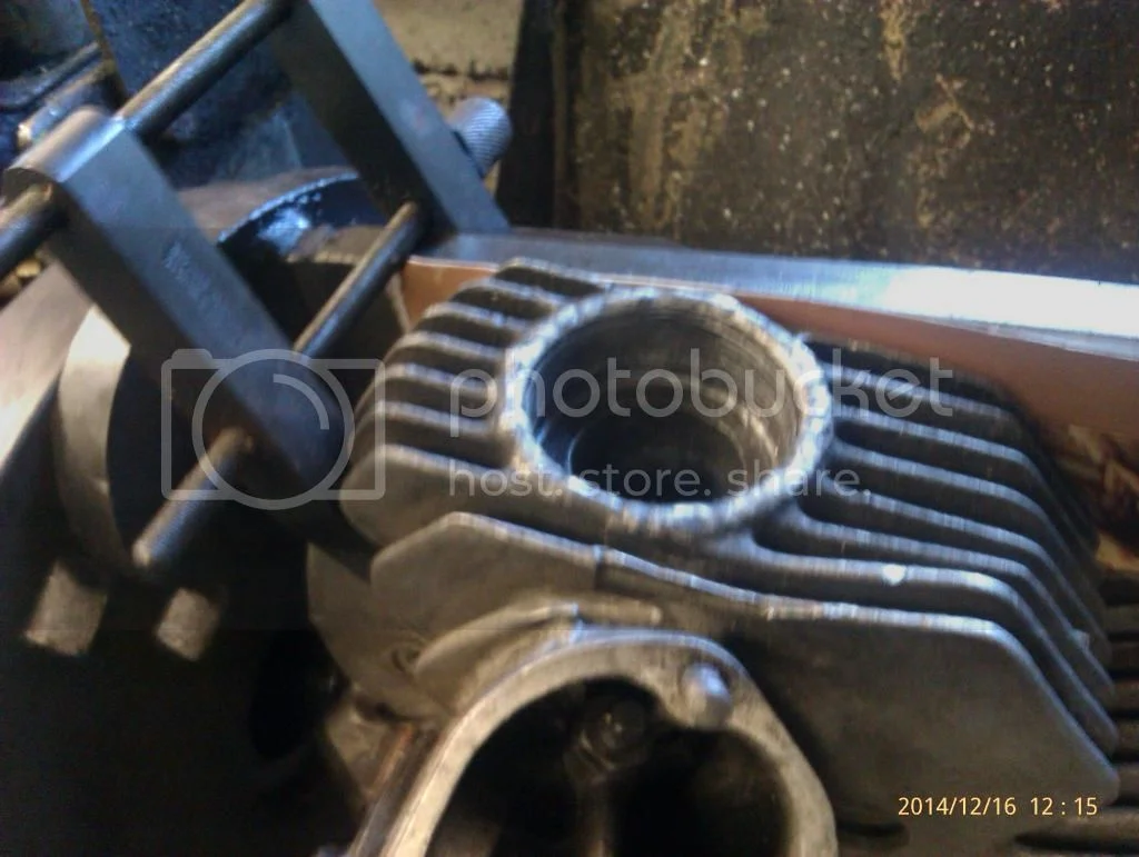 Exhaust thread repair on a lathe