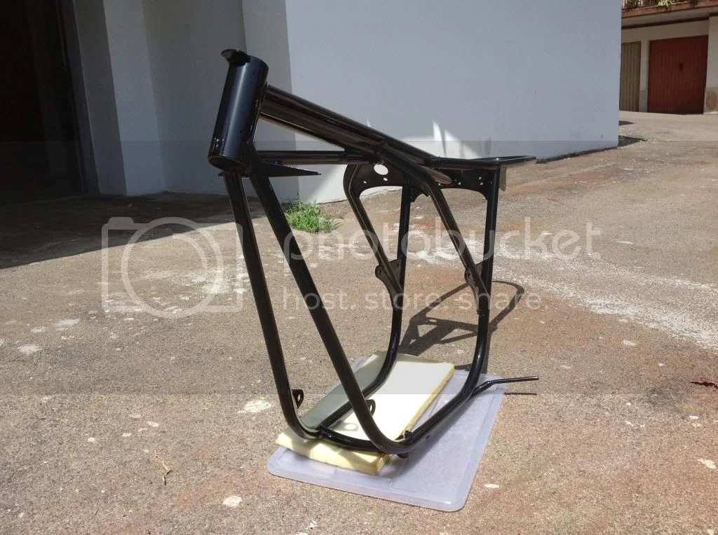 early narrow fender on later fatter tire