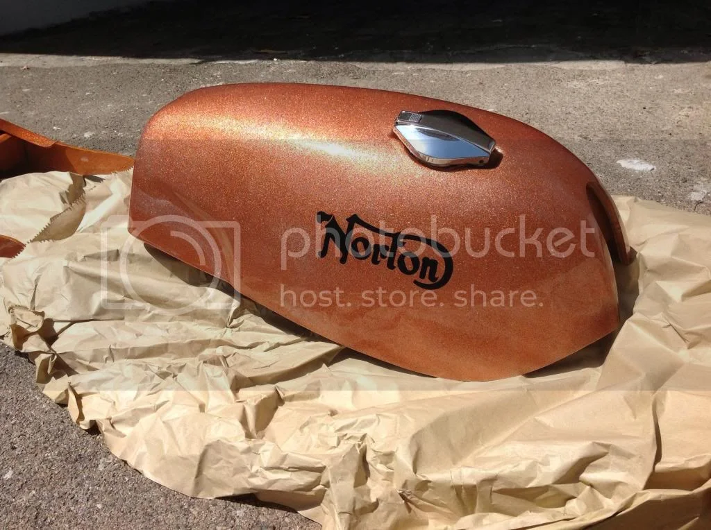 early narrow fender on later fatter tire