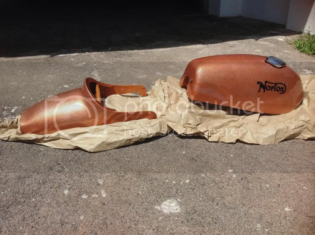 early narrow fender on later fatter tire