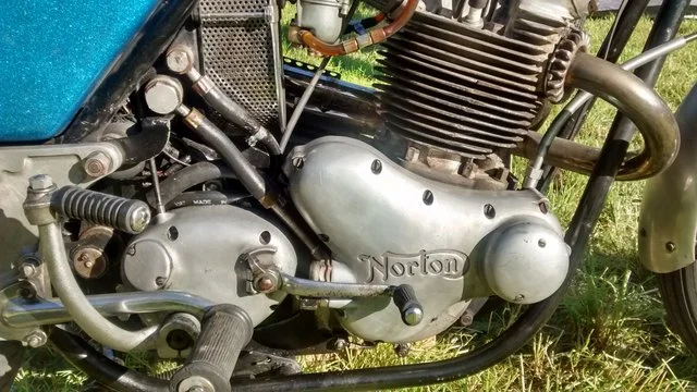 Early oil tank banjo feed and return