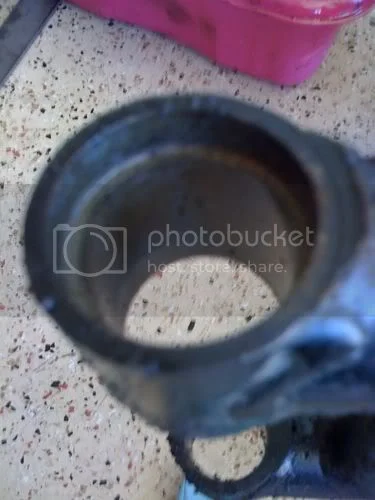 Swing arm spindle quandary (2011)