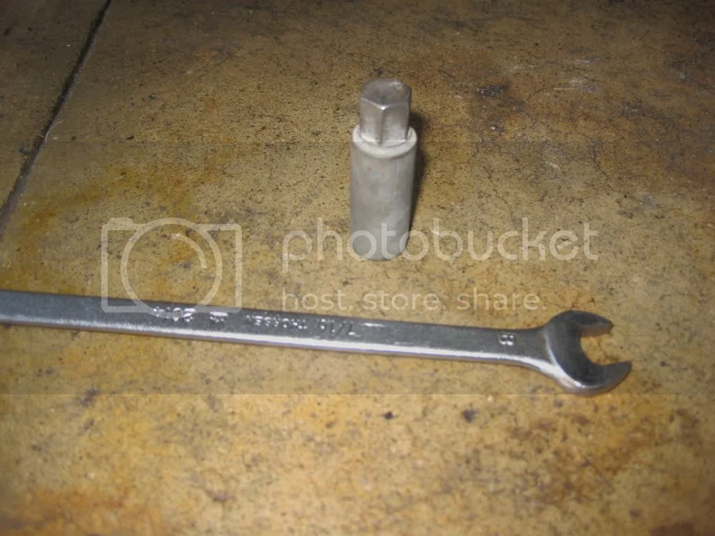 Head bolt oil leak question and pictures...help. Access Norton