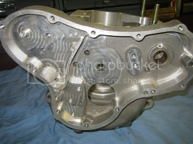 Camshaft bushes and breather