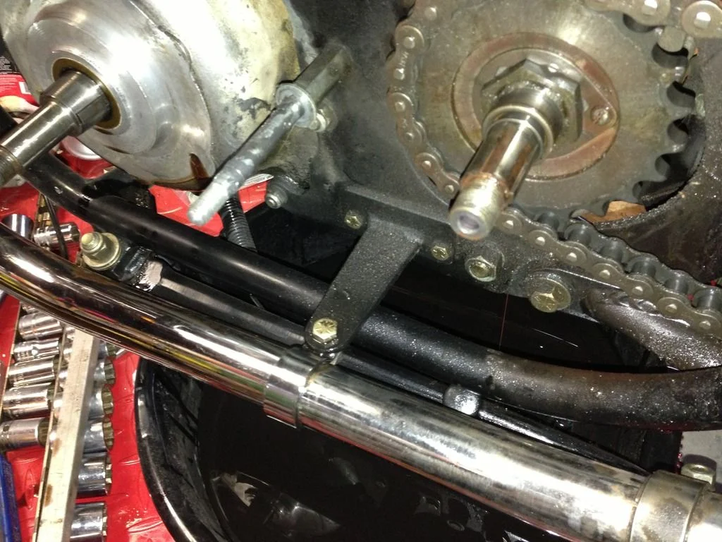 Engineering compromises leading to exhaust threads stripped (2012)