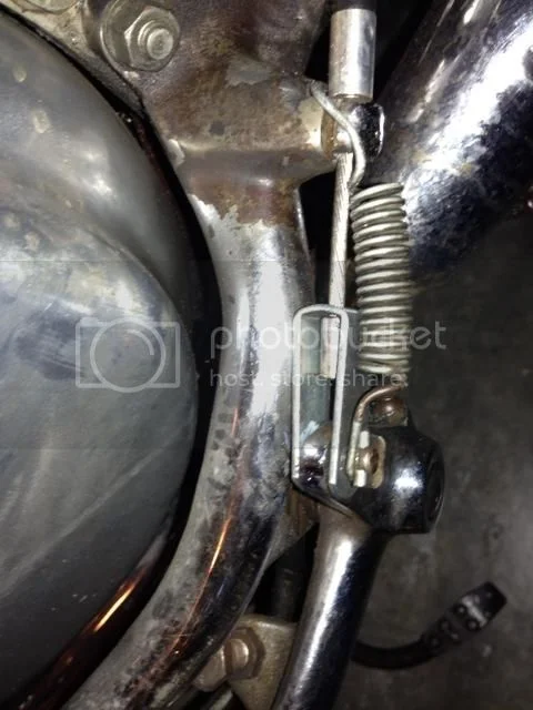 Rear brake return spring
