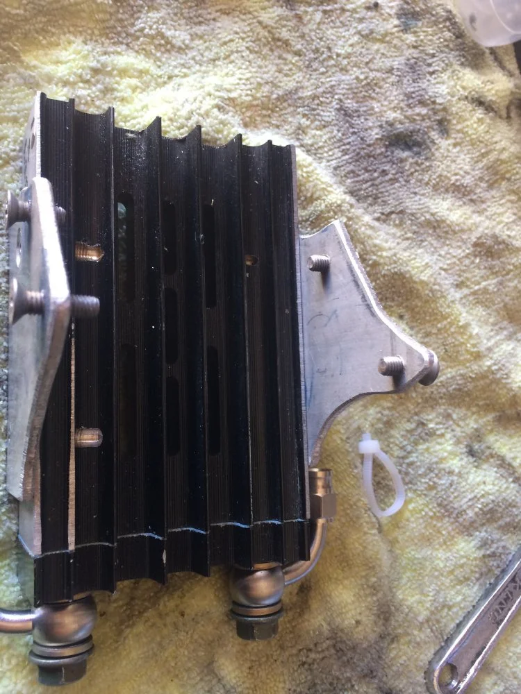 Oil cooler MOUNTING locations/designs on Commandos, let’s see ‘em