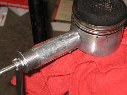 Removing swing-arm bushings without a press