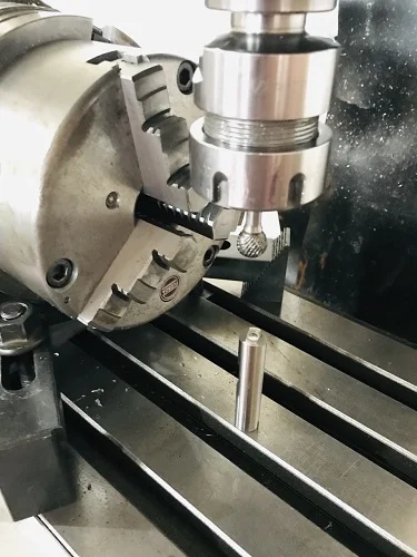 Drilling rocker spindles.