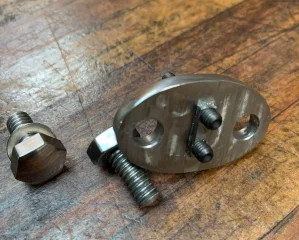 Rocker spindle misaligned. Rocker spindle misaligned.