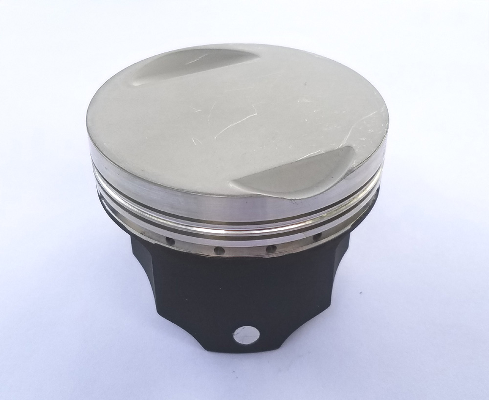 ceramic top pistons with graphite skirts
